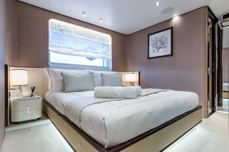 a bed in a room aboard AZIMUT GRANDE 27/52 Yacht for Sale