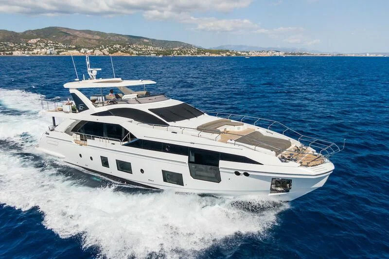 a boat on the water aboard AZIMUT GRANDE 27/52 Yacht for Sale