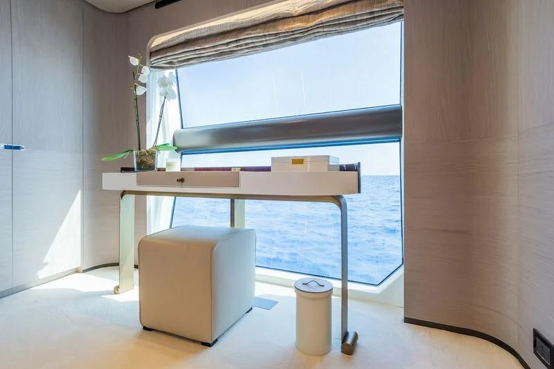 a room with a window and a desk aboard AZIMUT GRANDE 27/52 Yacht for Sale