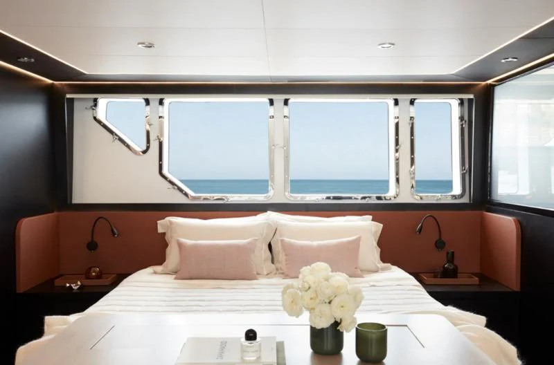 a bed with white pillows aboard LONGREEF 90/01 SX Yacht for Sale