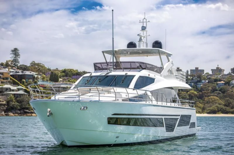 a white yacht in the water aboard LONGREEF 90/01 SX Yacht for Sale