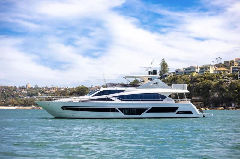 a white yacht on the water aboard LONGREEF 90/01 SX Yacht for Sale
