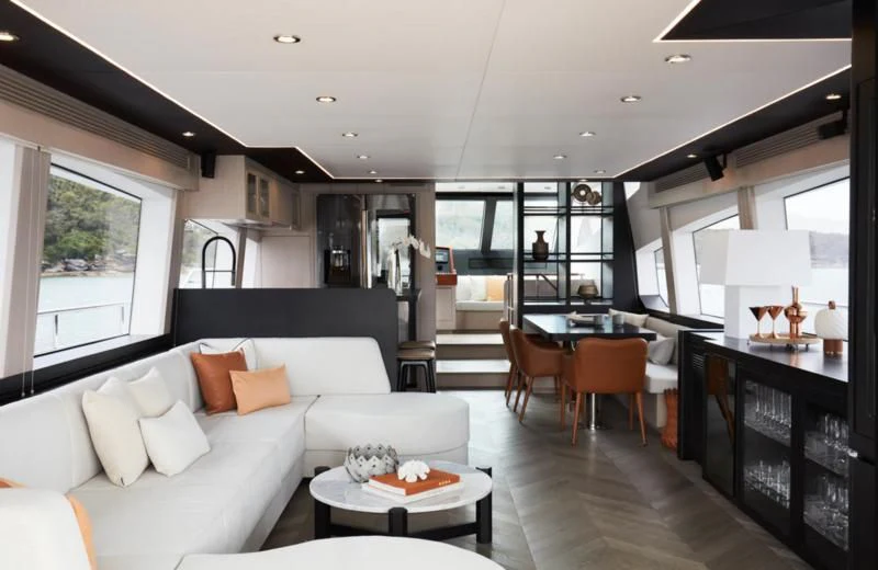 a living room with a large window aboard LONGREEF 90/01 SX Yacht for Sale