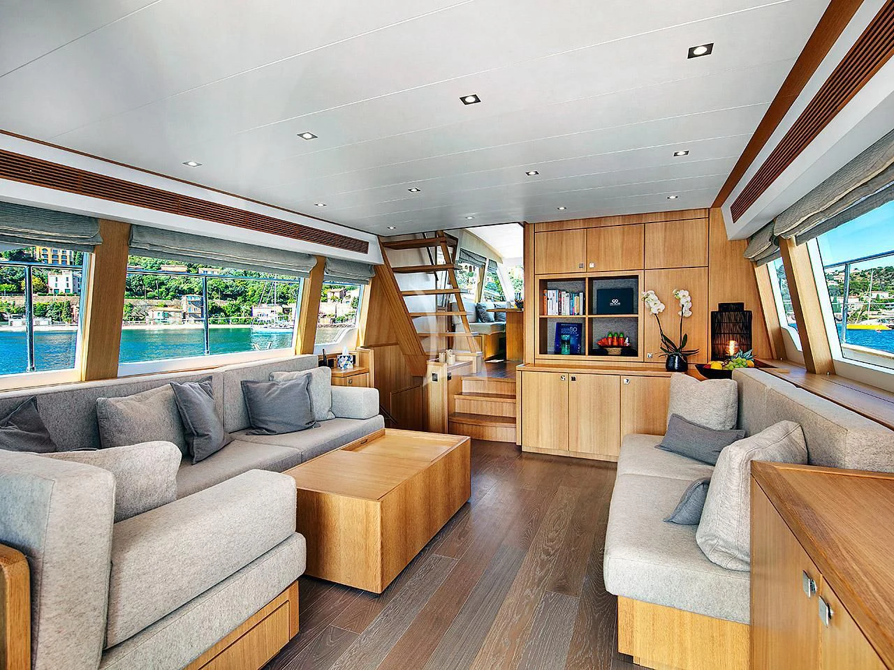 a living room with a large window aboard ARMONEE Yacht for Sale