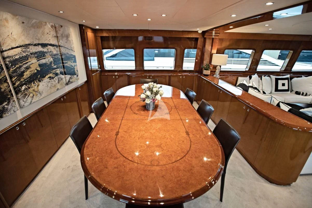 a large conference room with a table and chairs aboard THEION Yacht for Sale