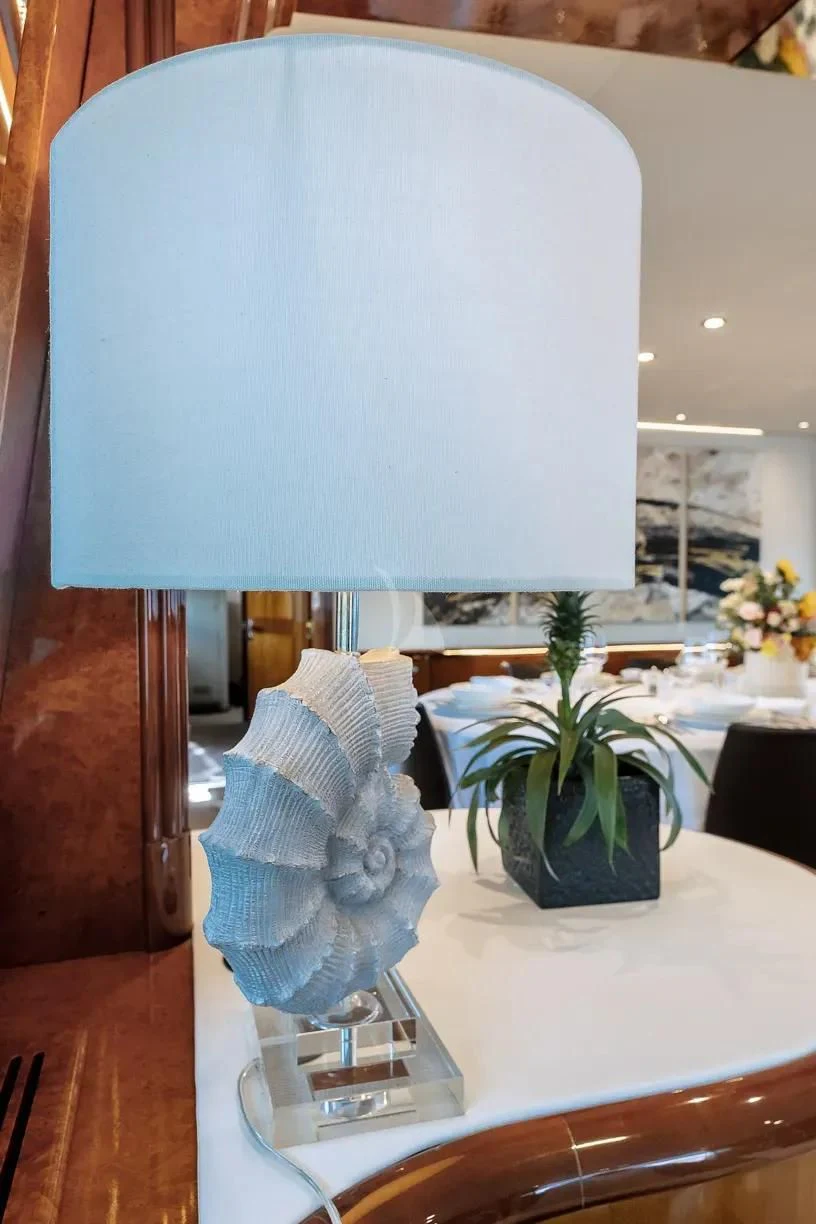 a white lamp on a table aboard THEION Yacht for Sale