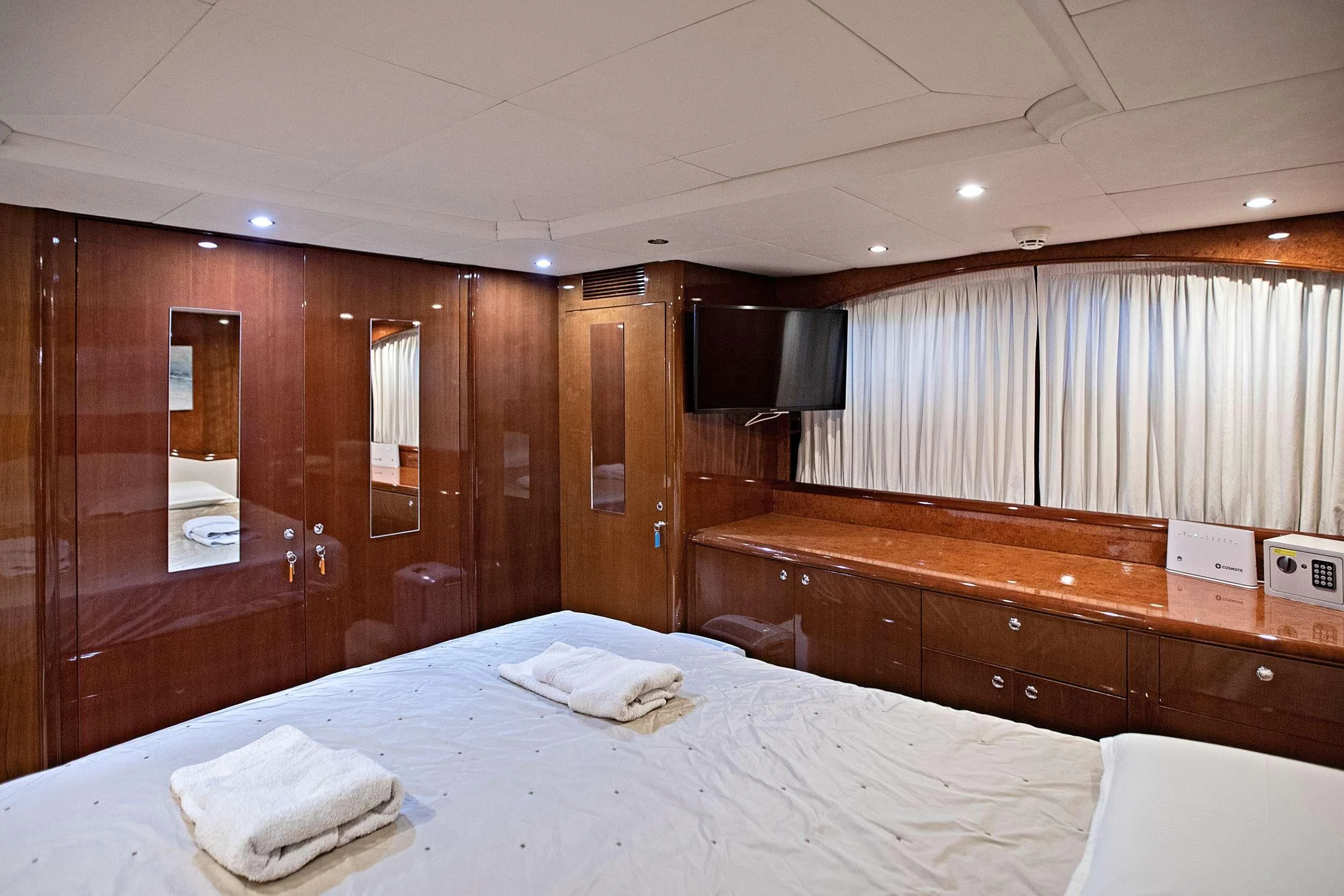 a bed in a room aboard THEION Yacht for Sale