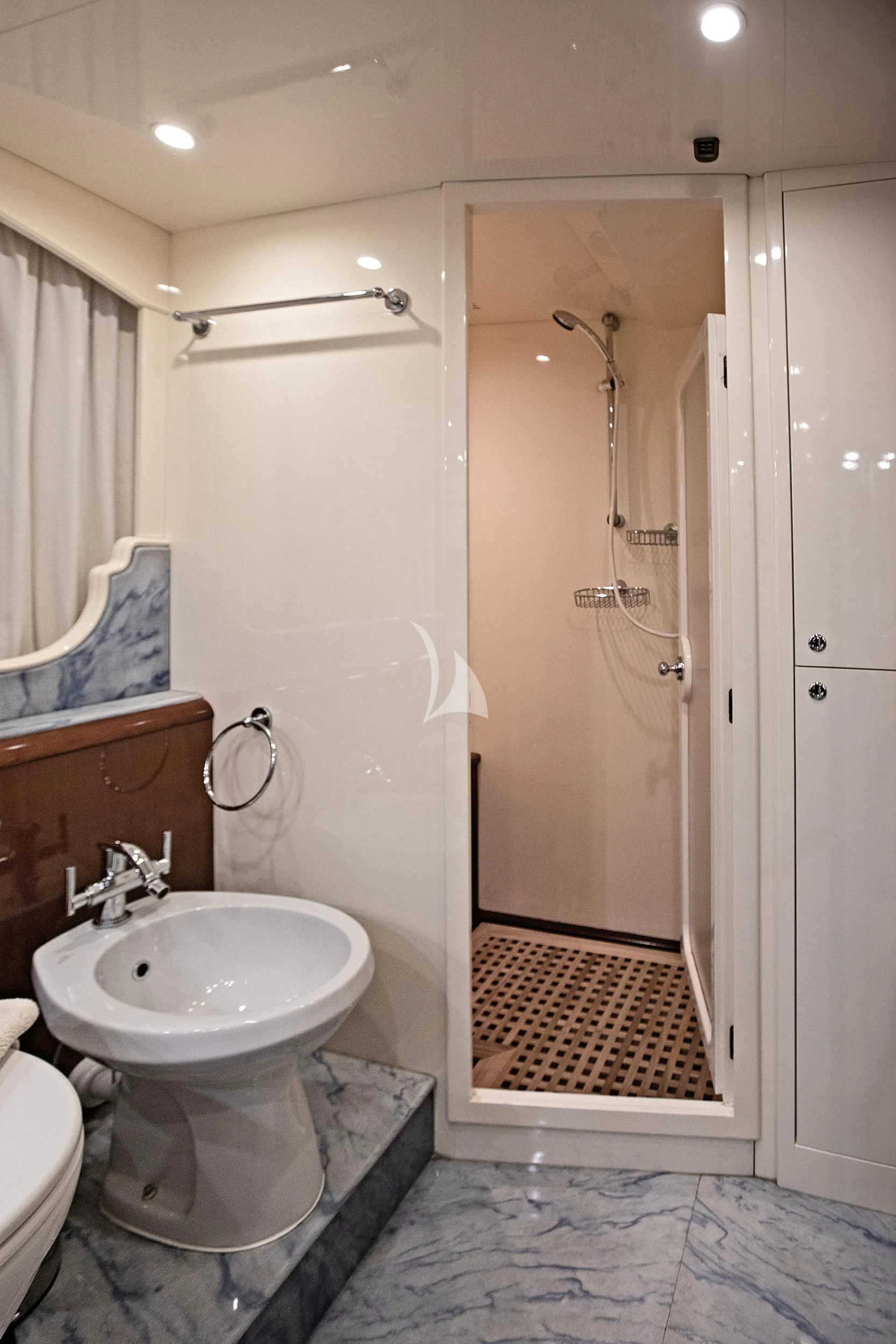a bathroom with a sink and a shower aboard THEION Yacht for Sale