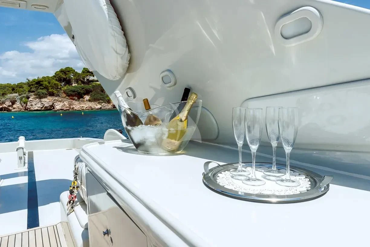 a group of glasses on a table aboard THEION Yacht for Sale
