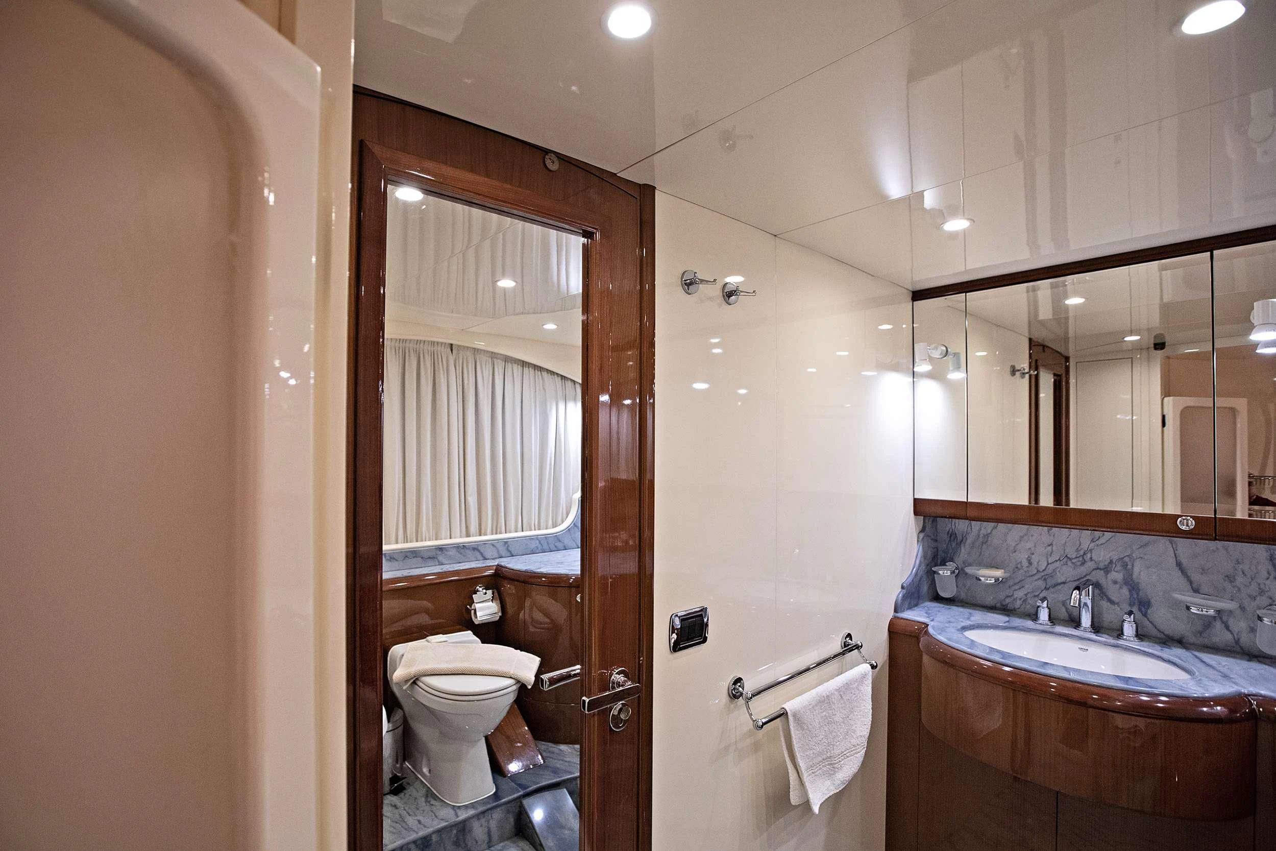 a bathroom with a sink and a toilet aboard THEION Yacht for Sale