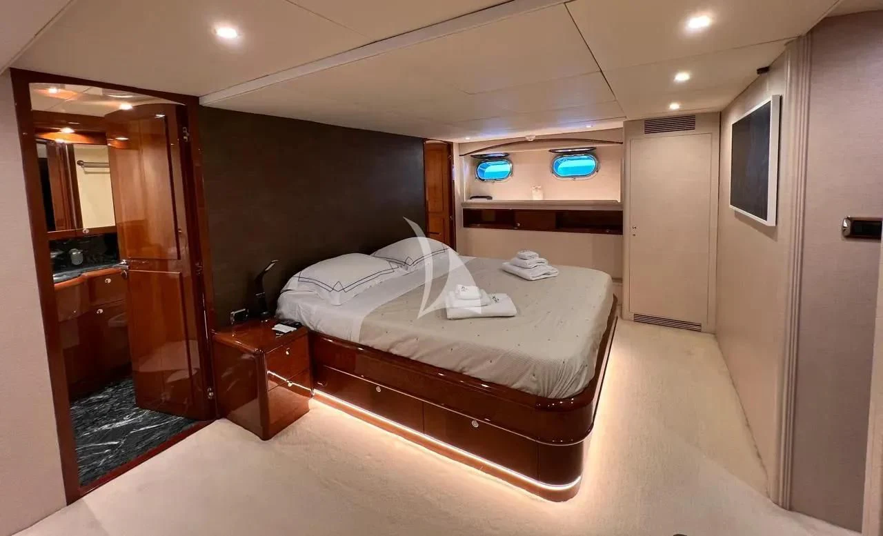 a hotel room with a bed aboard THEION Yacht for Sale