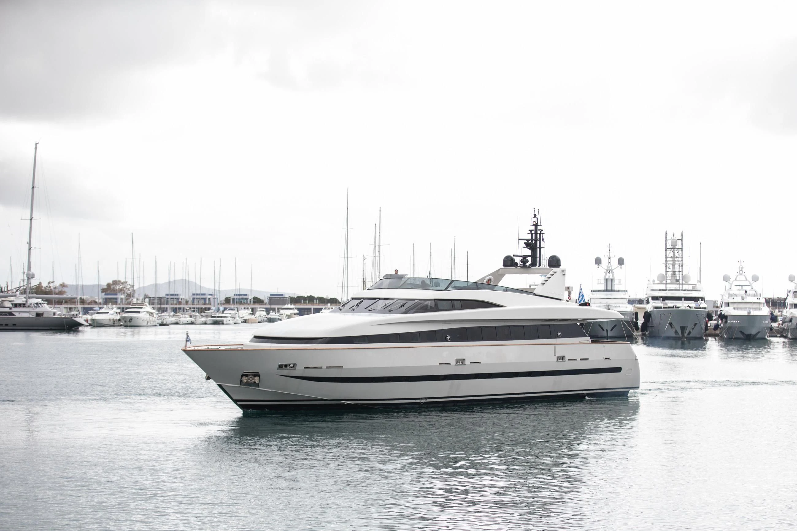 a large white boat in the water aboard THEION Yacht for Sale