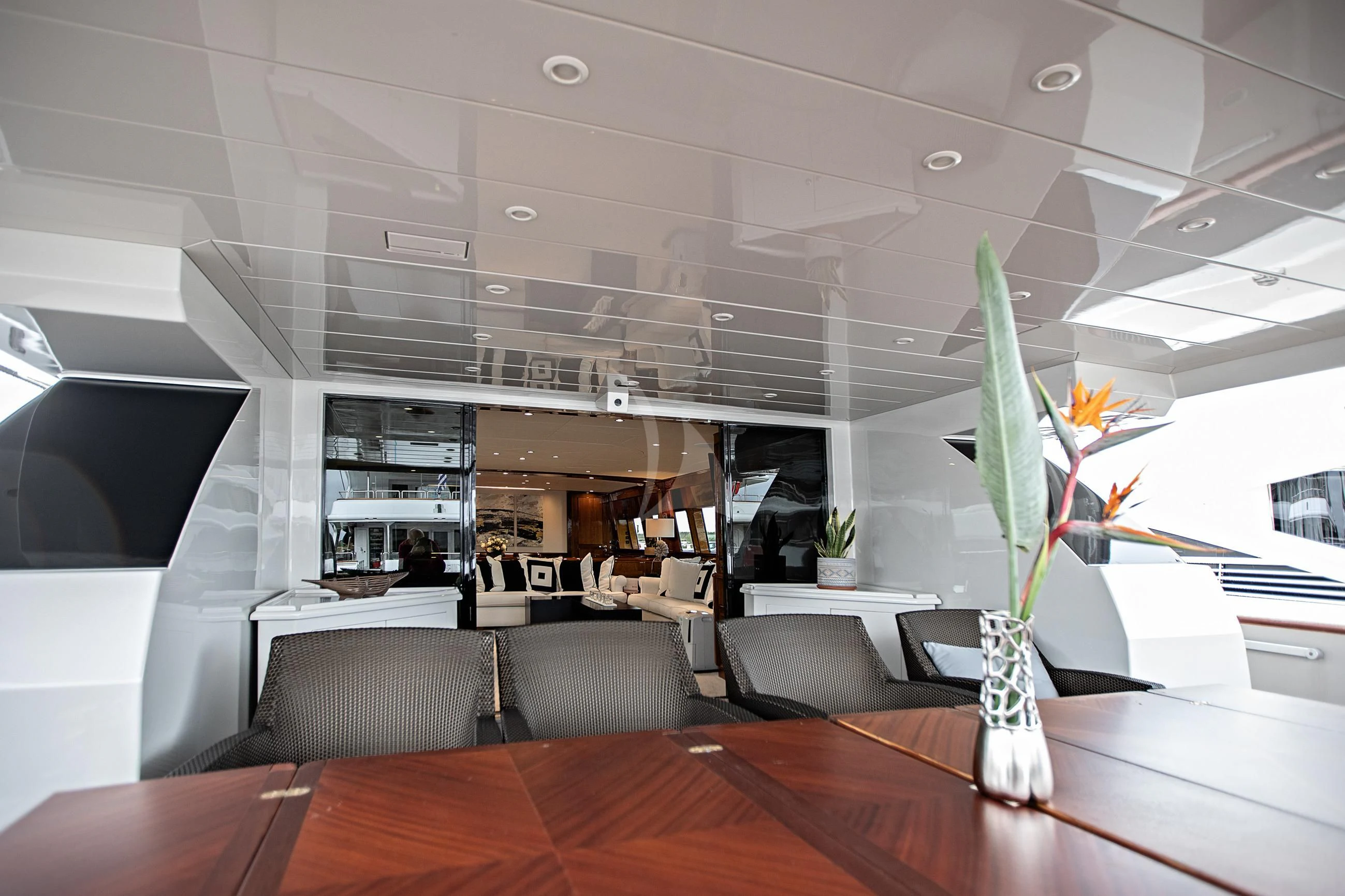 a room with a table and chairs aboard THEION Yacht for Sale