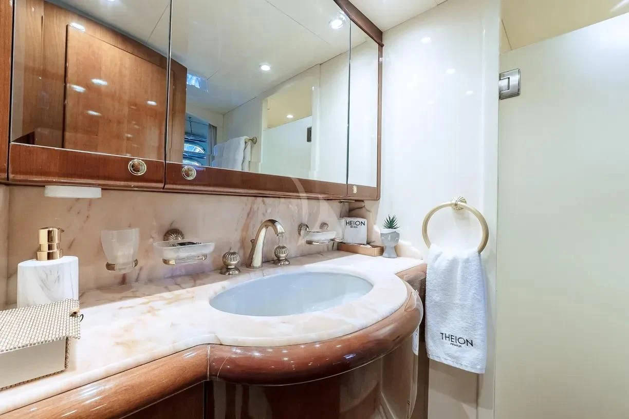a bathroom with a large mirror aboard THEION Yacht for Sale
