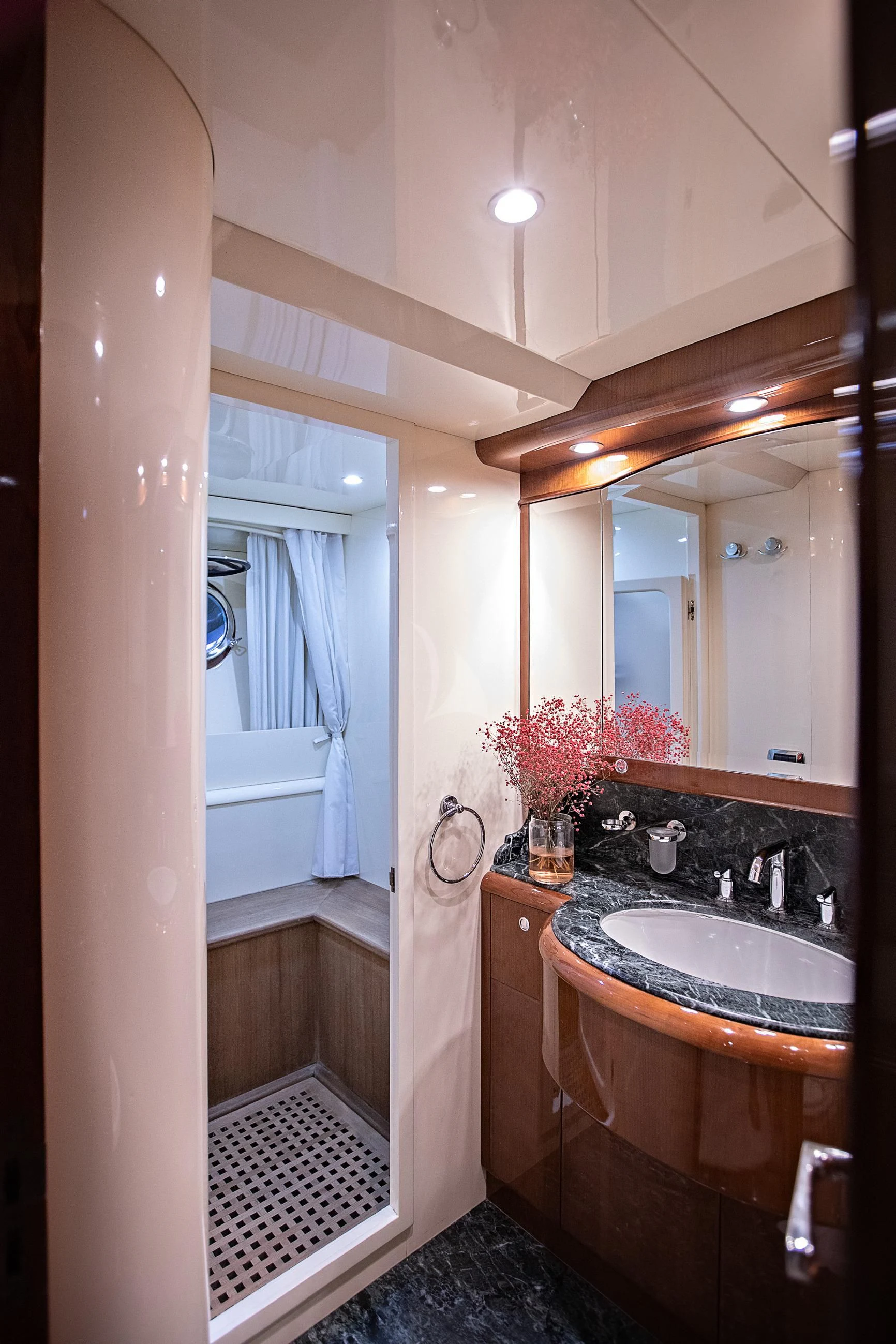 a bathroom with a sink and a mirror aboard THEION Yacht for Sale