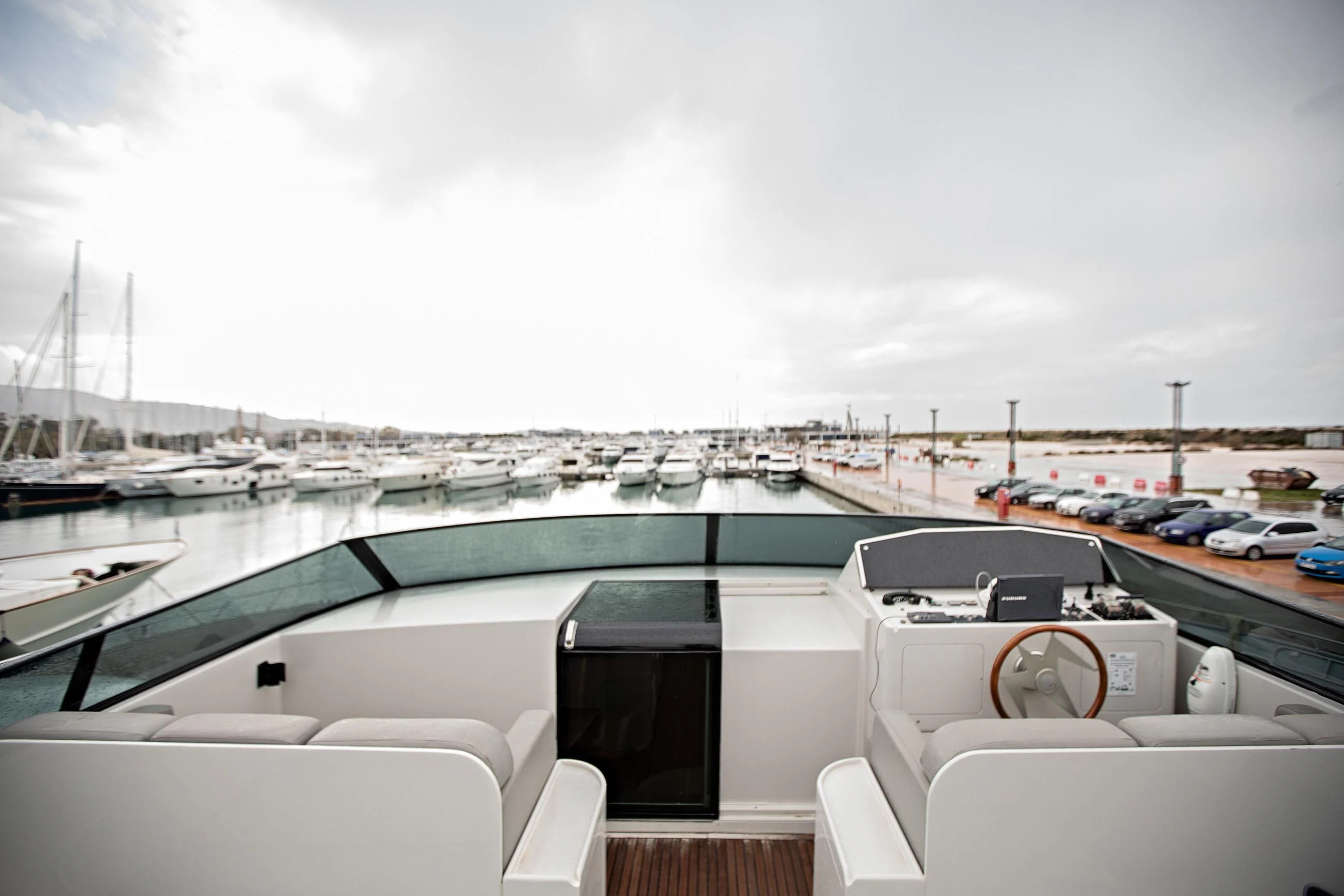 a boat dock with boats aboard THEION Yacht for Sale