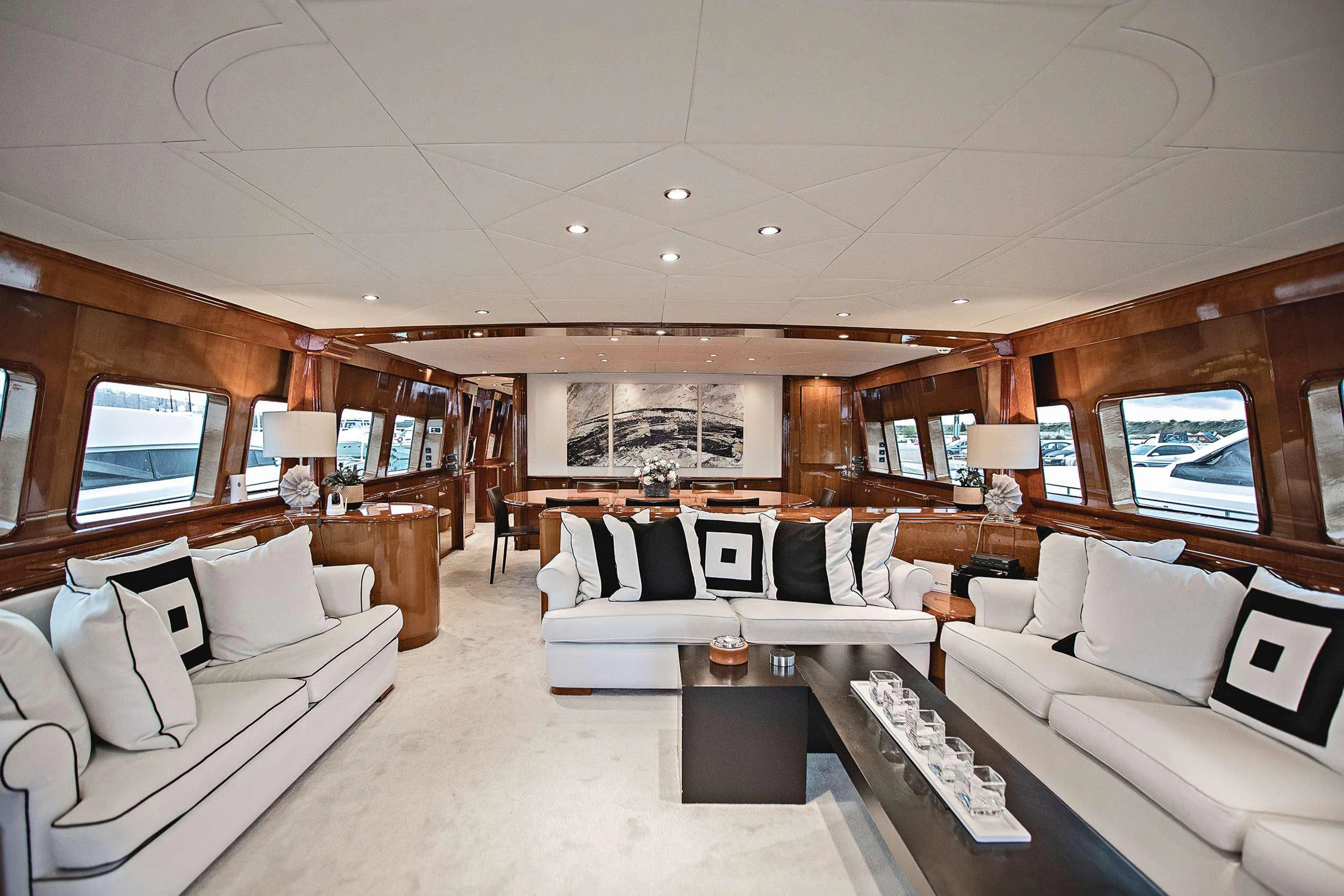 a living room with a large window aboard THEION Yacht for Sale