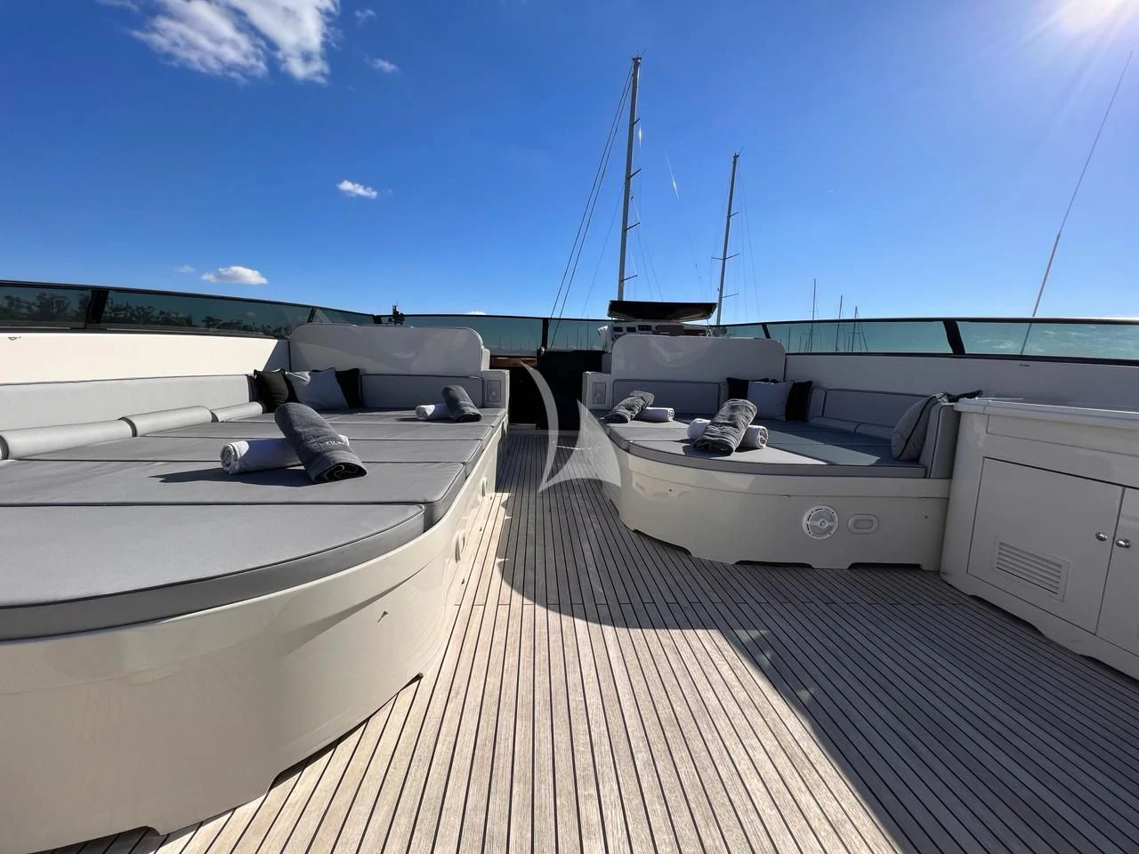 a deck with a deck and boats on it aboard THEION Yacht for Sale
