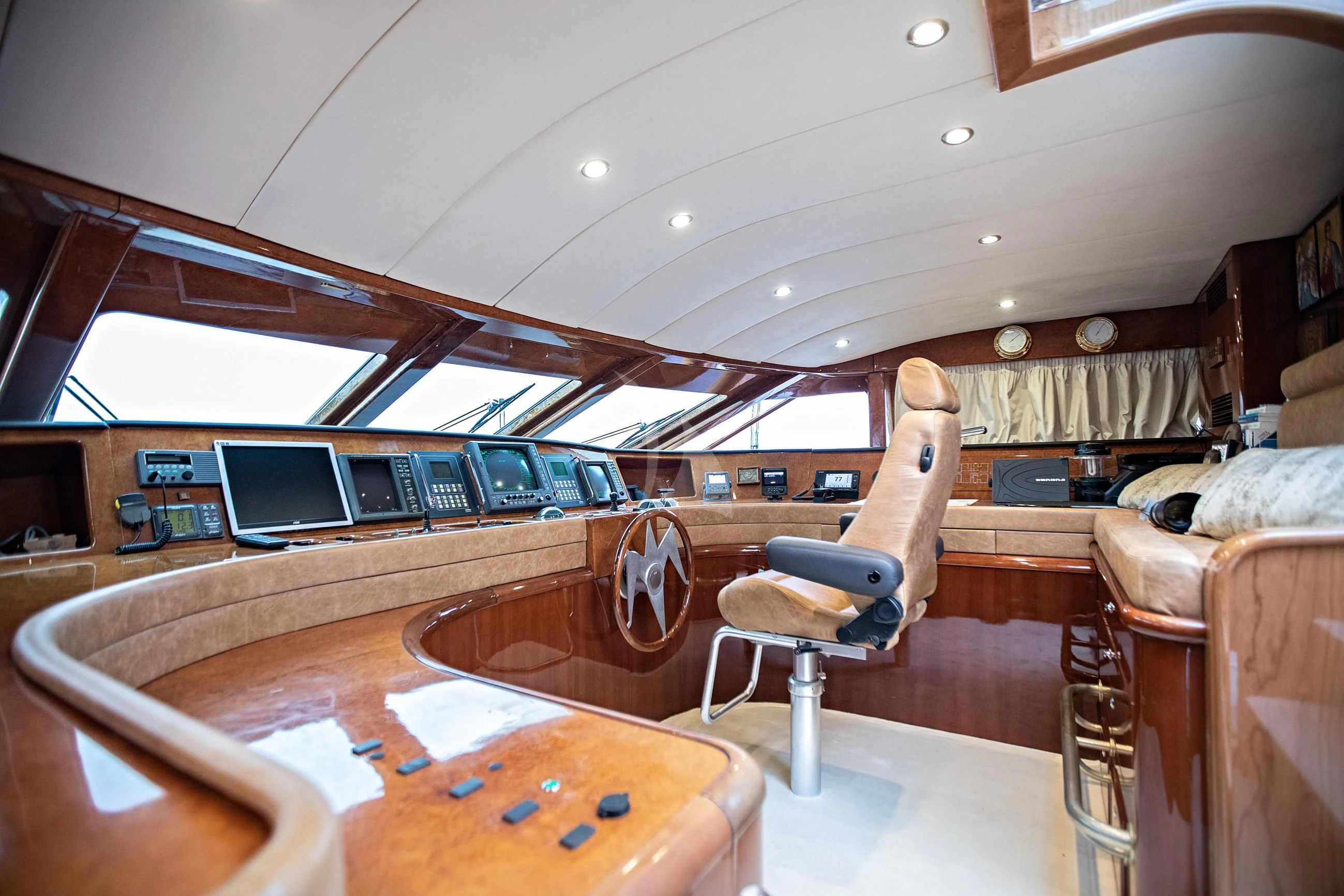 a room with a table and chairs aboard THEION Yacht for Sale