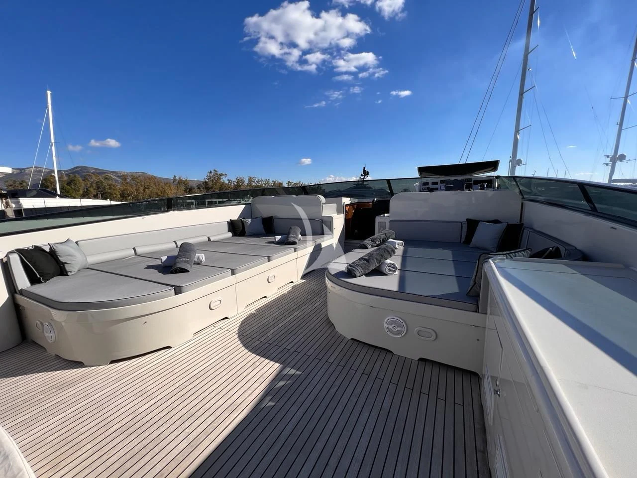 a group of boats are parked on a dock aboard THEION Yacht for Sale