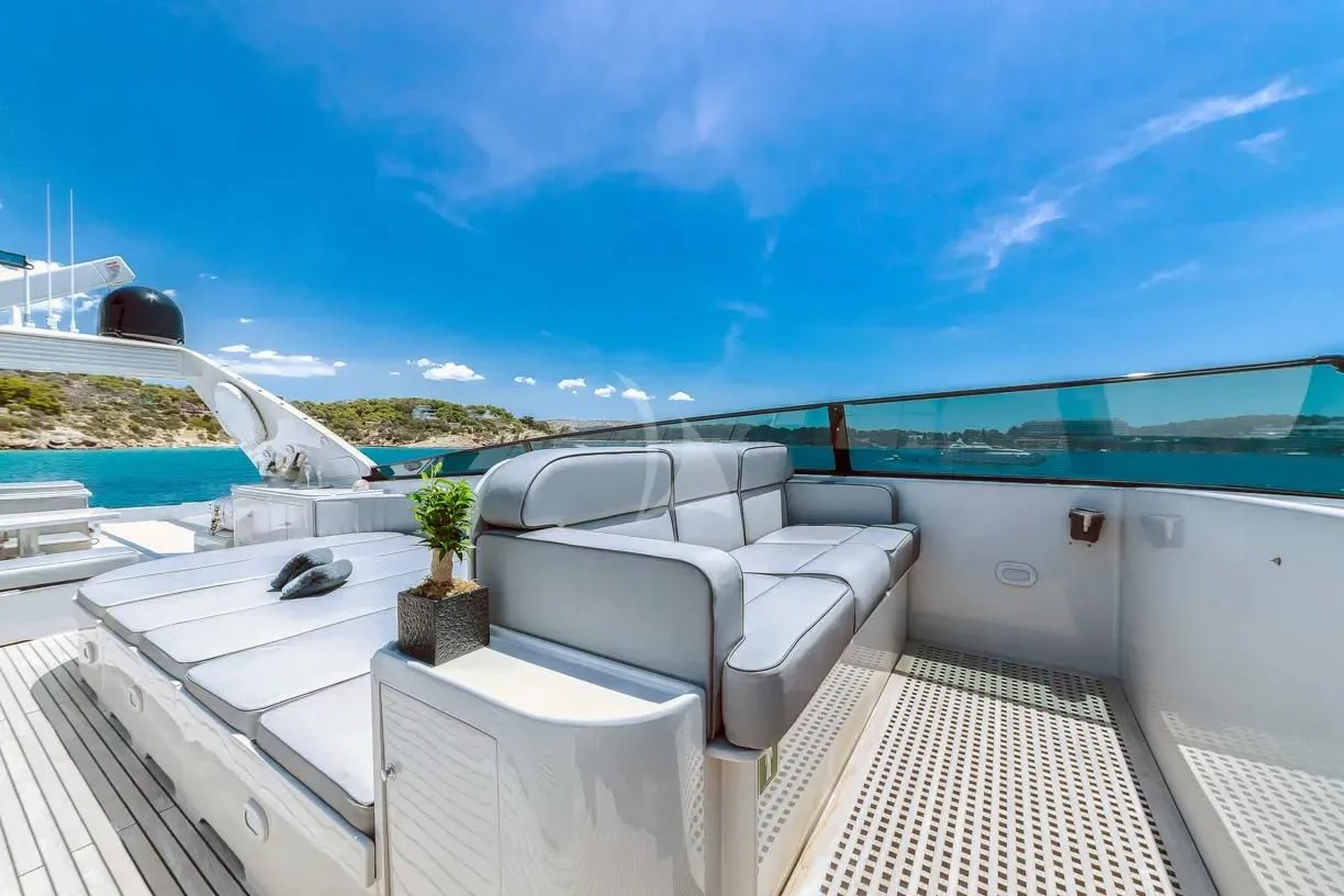 a deck with chairs and a pool aboard THEION Yacht for Sale