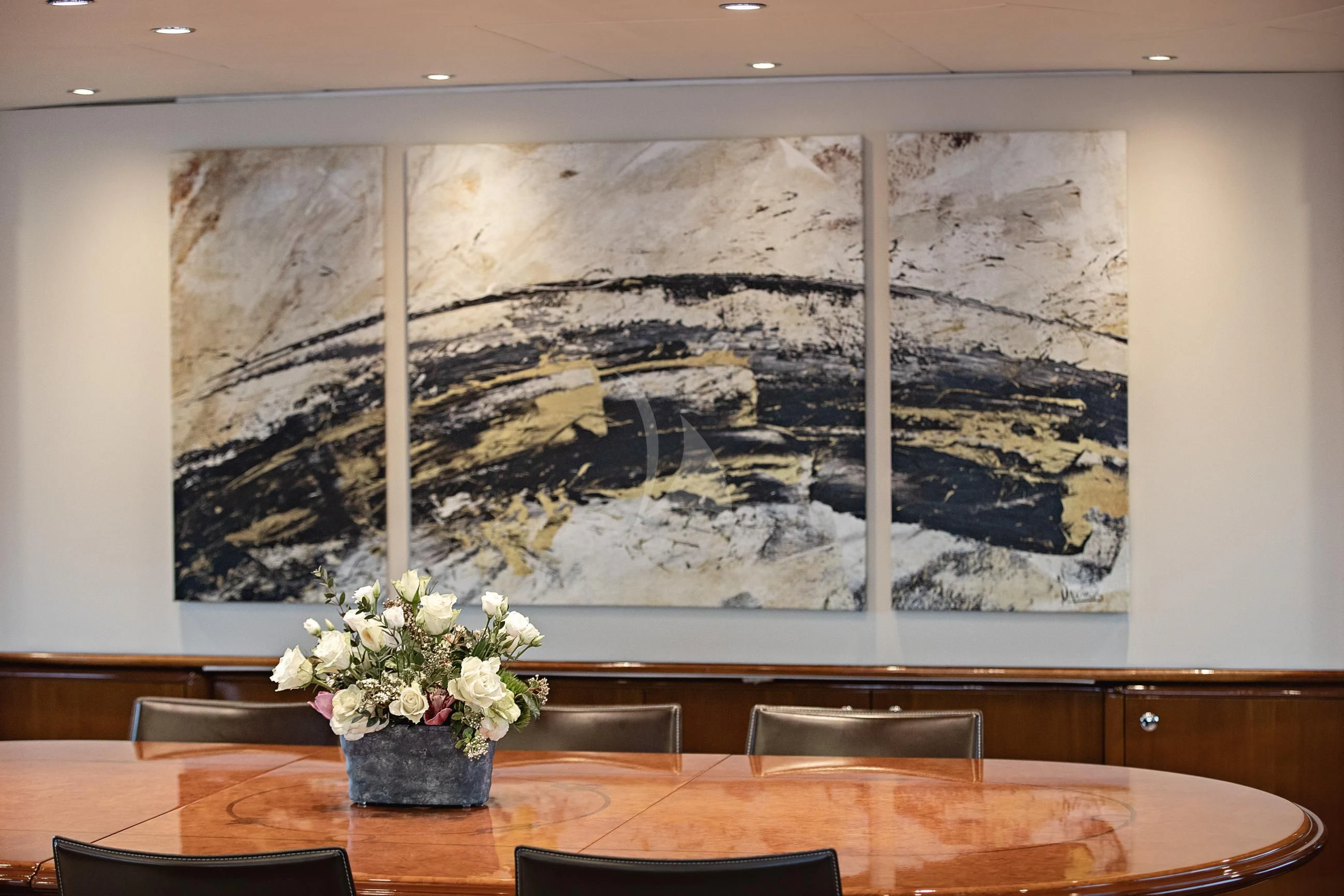 a large painting on a wall aboard THEION Yacht for Sale