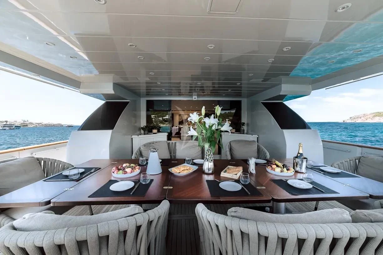 a dining table on a boat aboard THEION Yacht for Sale