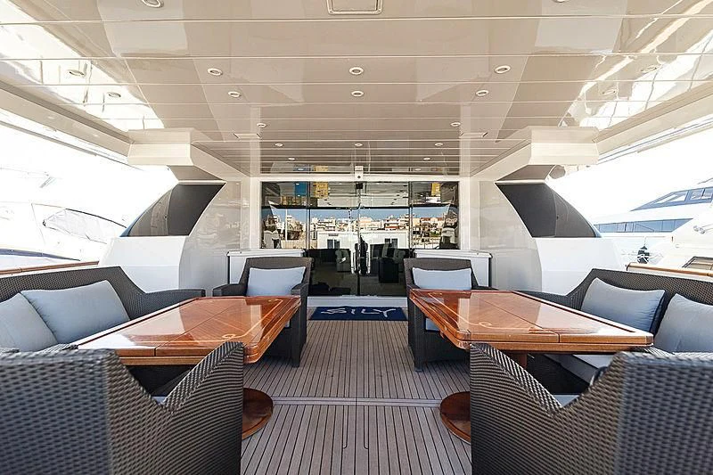 inside of a building with a table and chairs aboard THEION Yacht for Sale
