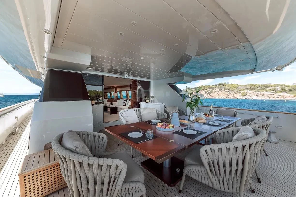 a dining table on a boat aboard THEION Yacht for Sale