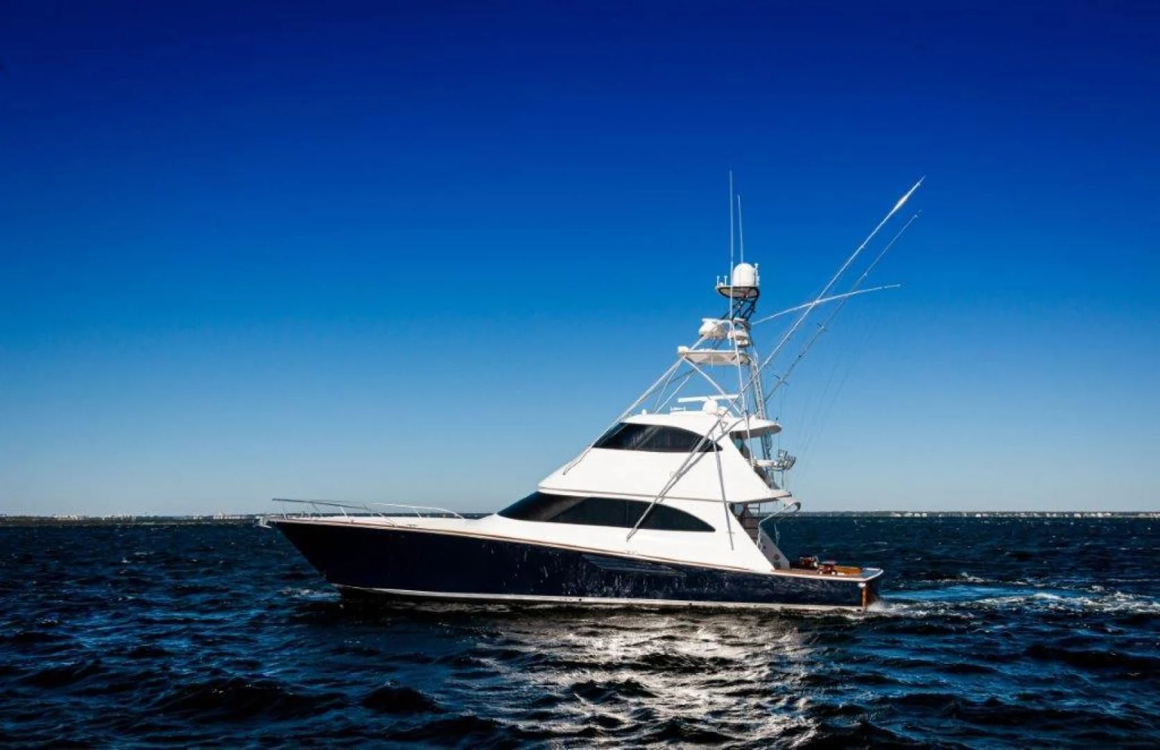 a boat in the water aboard POUR INTENTIONS Yacht for Sale