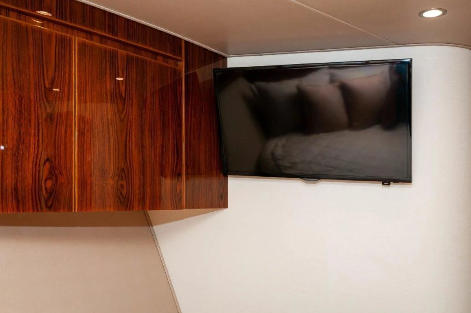 a couch in a room aboard POUR INTENTIONS Yacht for Sale