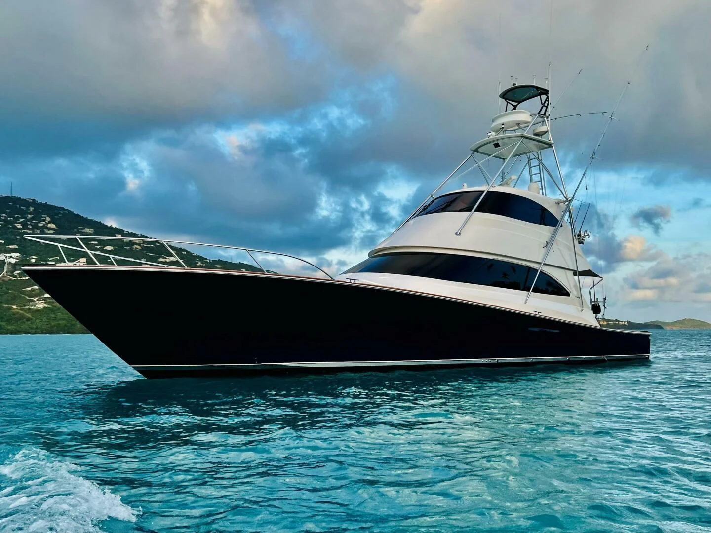 a boat in the water aboard POUR INTENTIONS Yacht for Sale