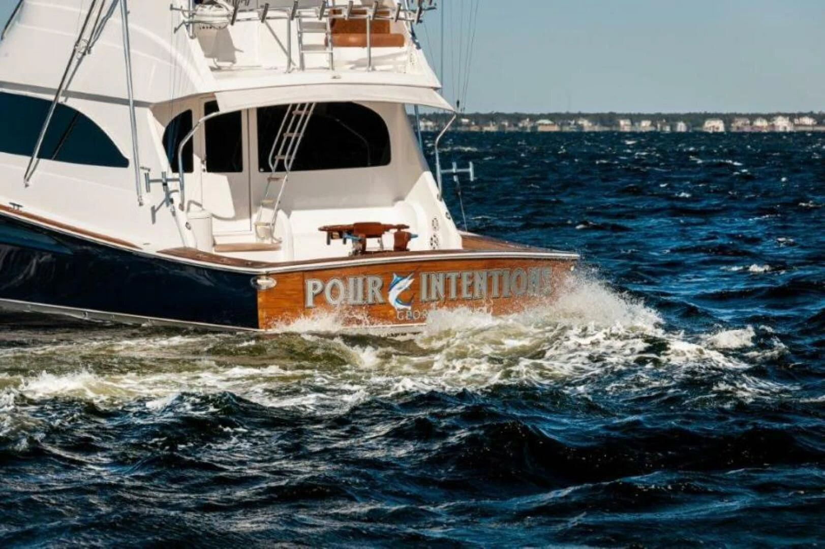a boat in the water aboard POUR INTENTIONS Yacht for Sale