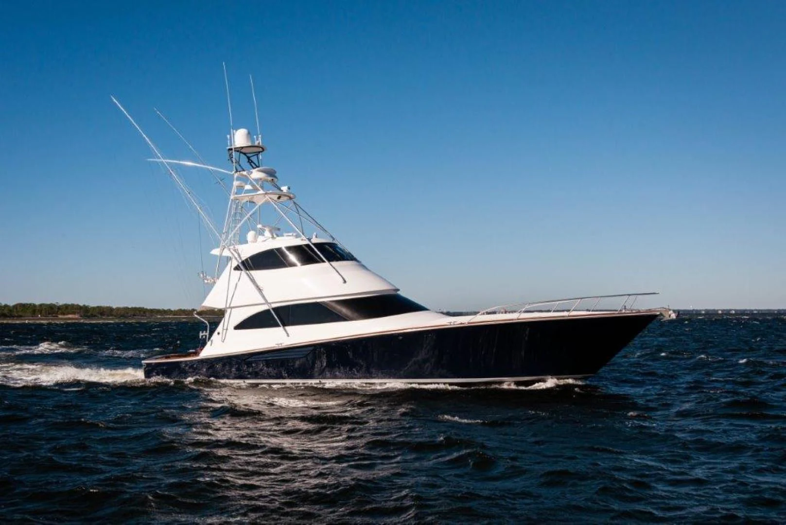 a boat on the water aboard POUR INTENTIONS Yacht for Sale
