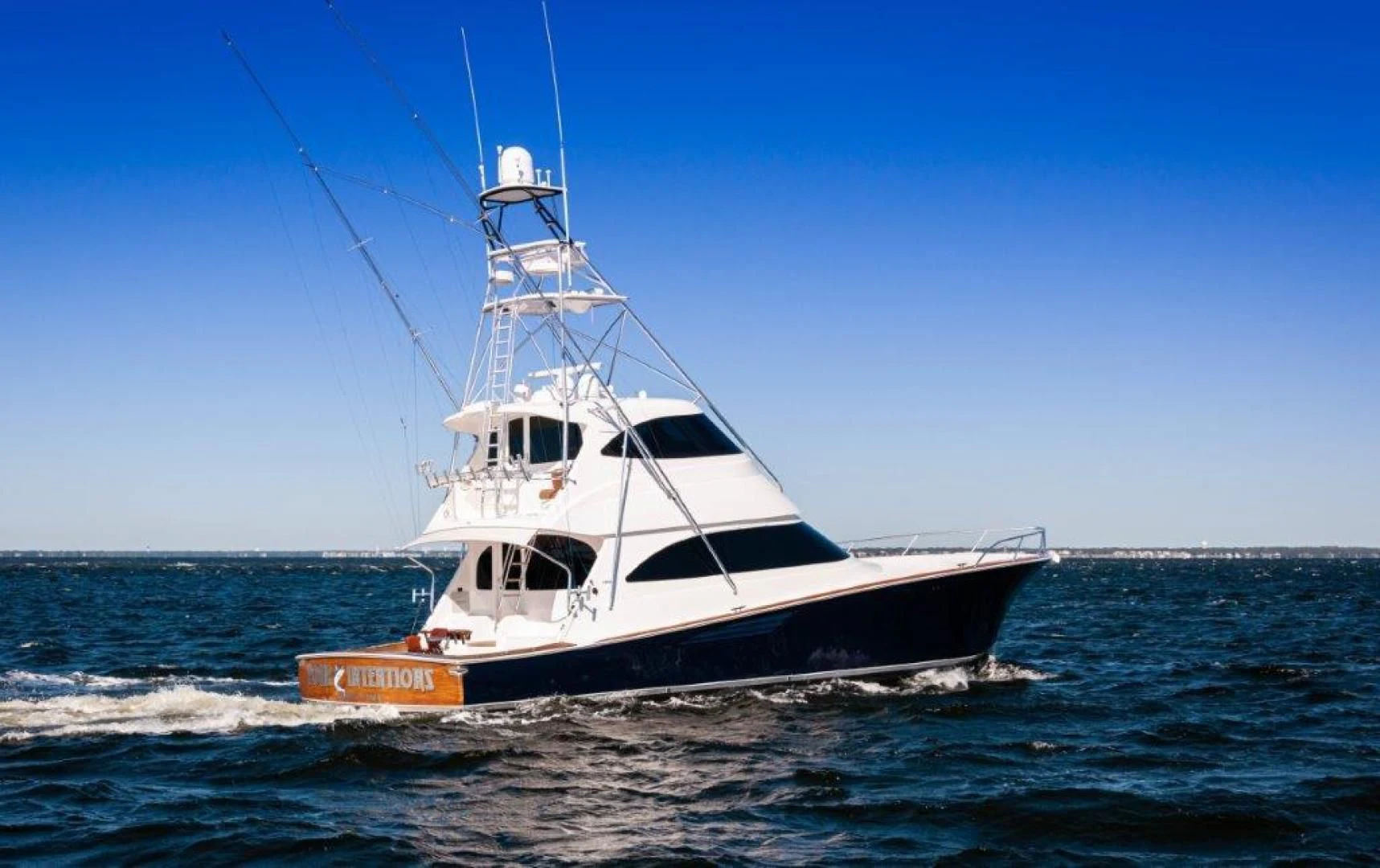 a boat on the water aboard POUR INTENTIONS Yacht for Sale