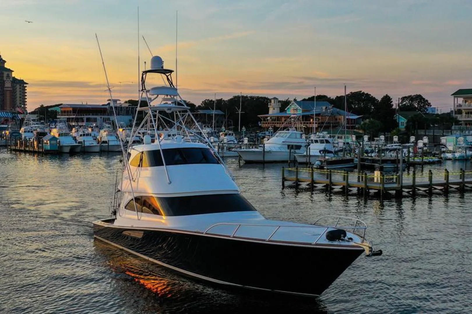 a boat is parked in a harbor aboard POUR INTENTIONS Yacht for Sale