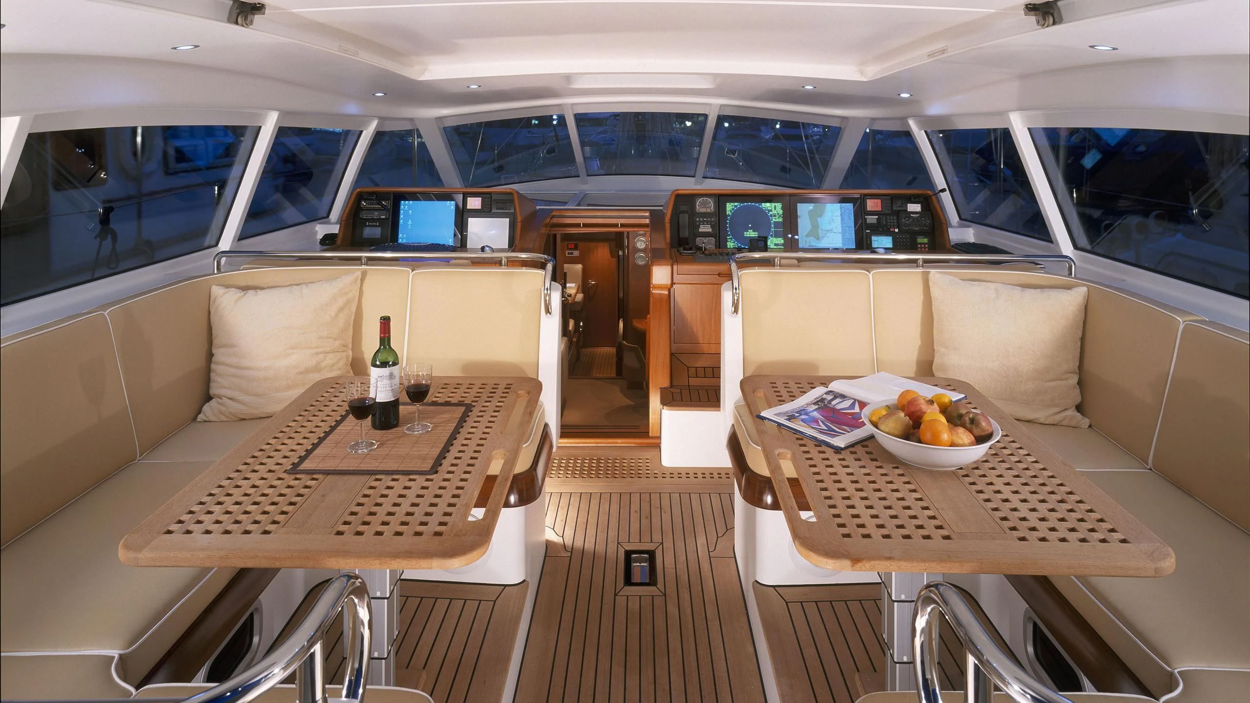 a room with a table and chairs aboard STALLA DE MUR Yacht for Sale