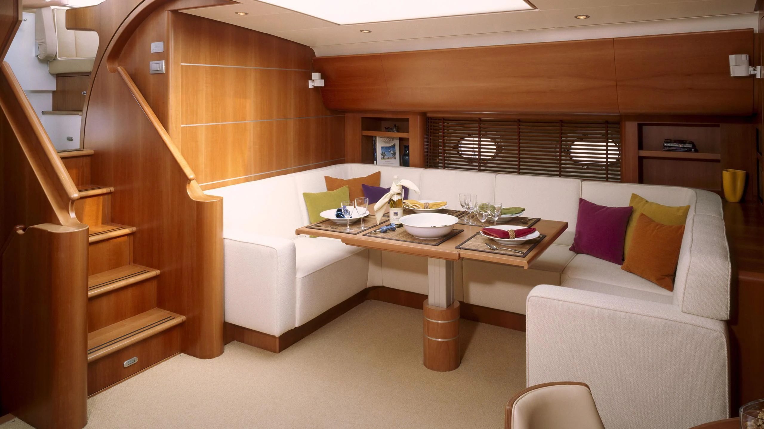 a room with a couch and a table aboard STALLA DE MUR Yacht for Sale