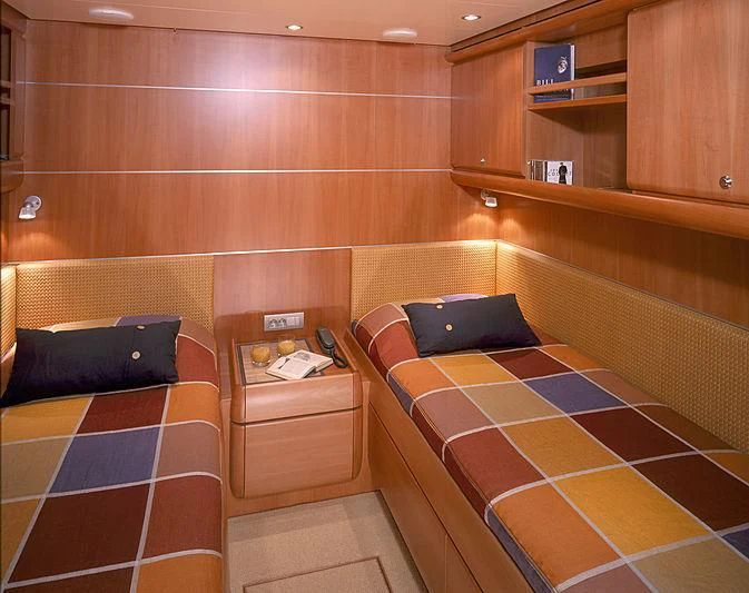 a room with a bed and a desk aboard STALLA DE MUR Yacht for Sale