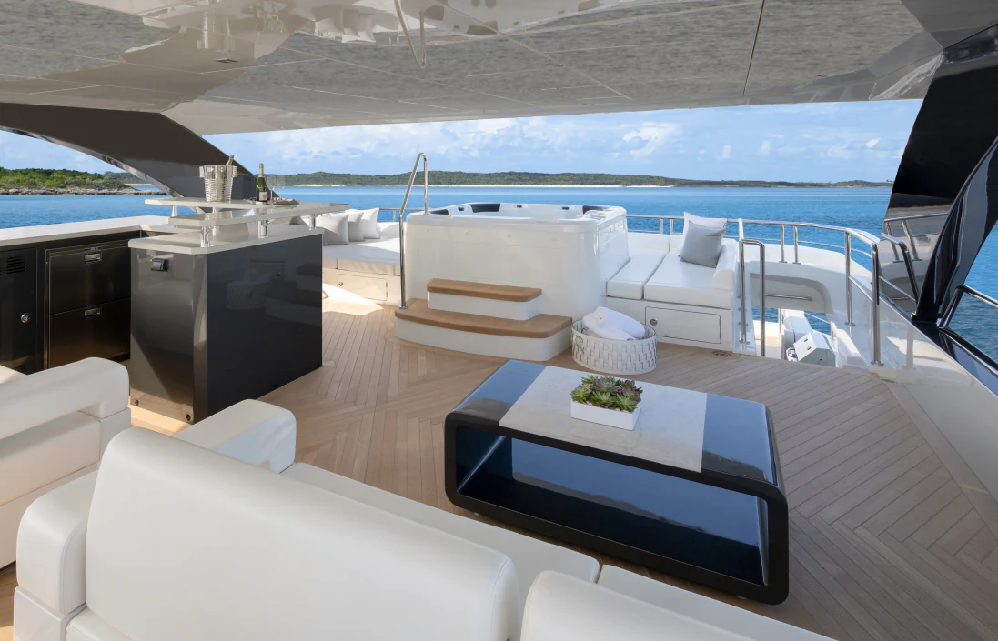 a room with a table and chairs aboard MAVERICK Yacht for Sale