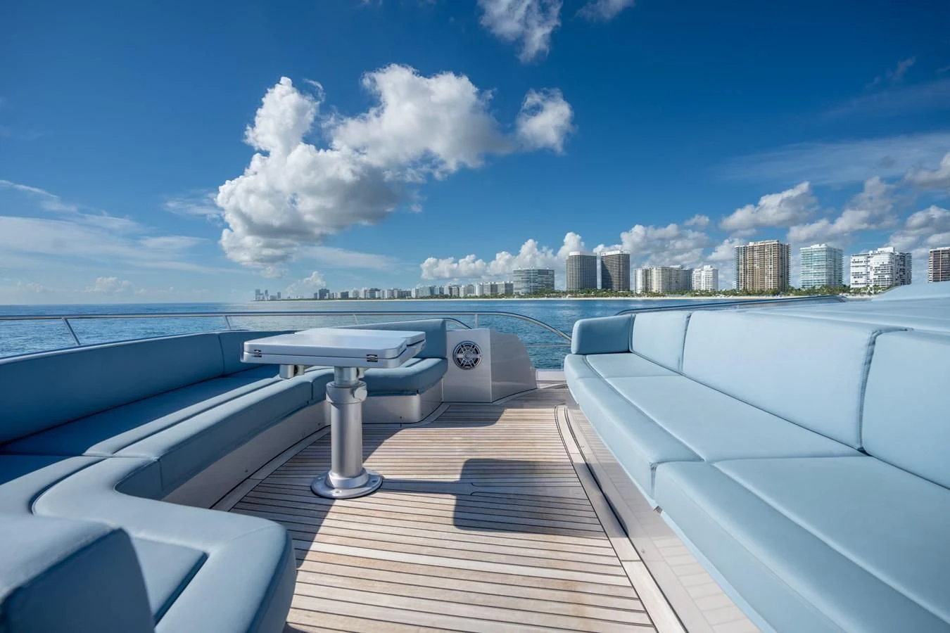a deck with a view of a city and water below aboard VINTAGE Yacht for Sale