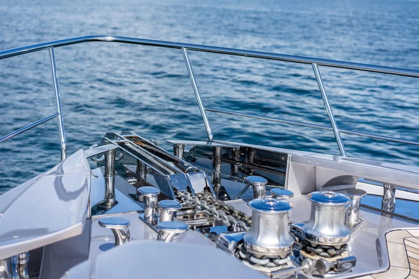 a boat with a metal railing aboard VINTAGE Yacht for Sale