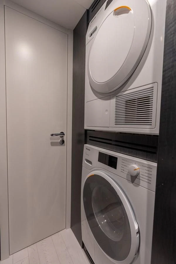 a white washing machine aboard VINTAGE Yacht for Sale