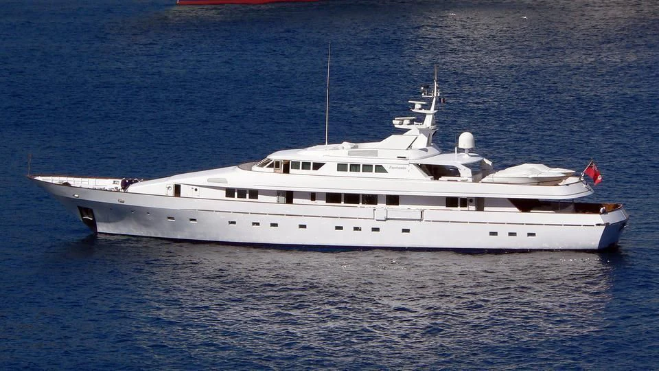 a white boat in the water aboard FANTASIA Yacht for Sale