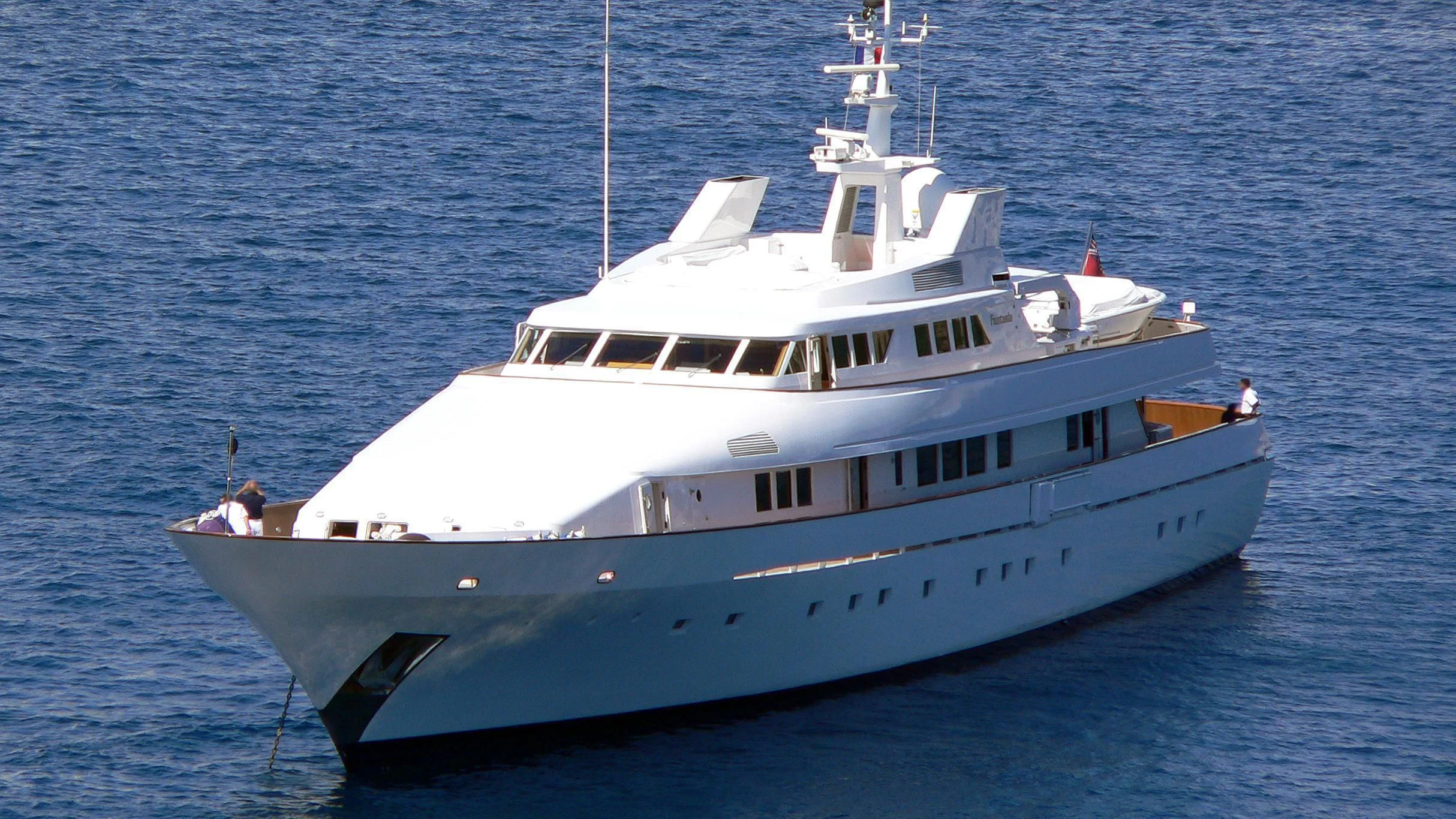 a white boat in the water aboard FANTASIA Yacht for Sale