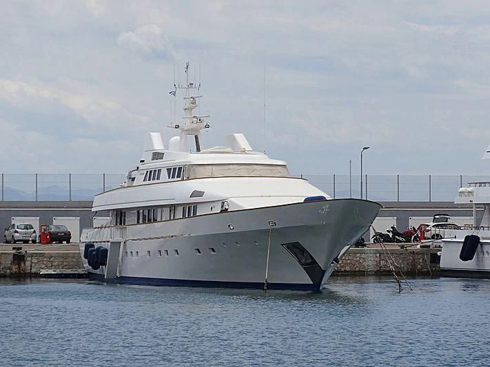 a large white ship docked aboard FANTASIA Yacht for Sale