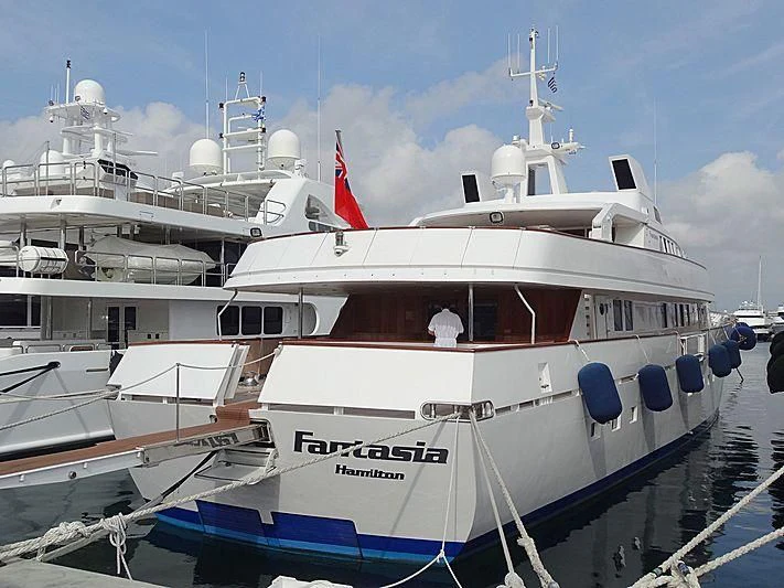 a large white boat aboard FANTASIA Yacht for Sale