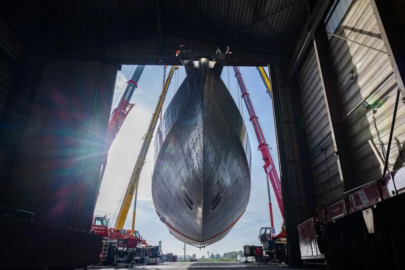 a large silver ball with a gold leaf on it aboard JFA 50M ALUMINIUM EXPLORER Yacht for Sale