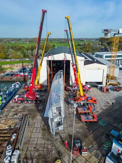 a large crane in a construction site aboard JFA 50M ALUMINIUM EXPLORER Yacht for Sale