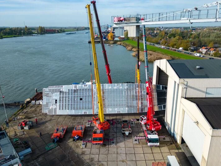 a large ship docked aboard JFA 50M ALUMINIUM EXPLORER Yacht for Sale